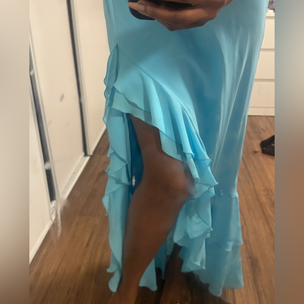 Aqua blue sleeveless hi-low ruffle maxi dress.